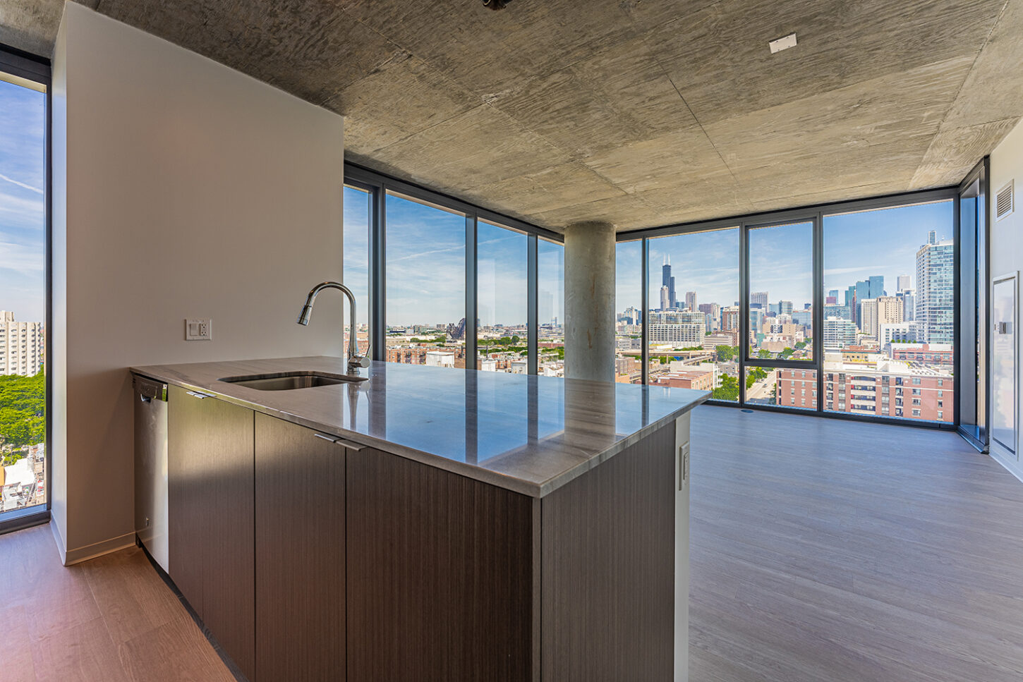 https://www.pmainc.com/wp-content/uploads/2020/02/Unit-1814-Living-Room-and-Kitchen-1450x967.jpg