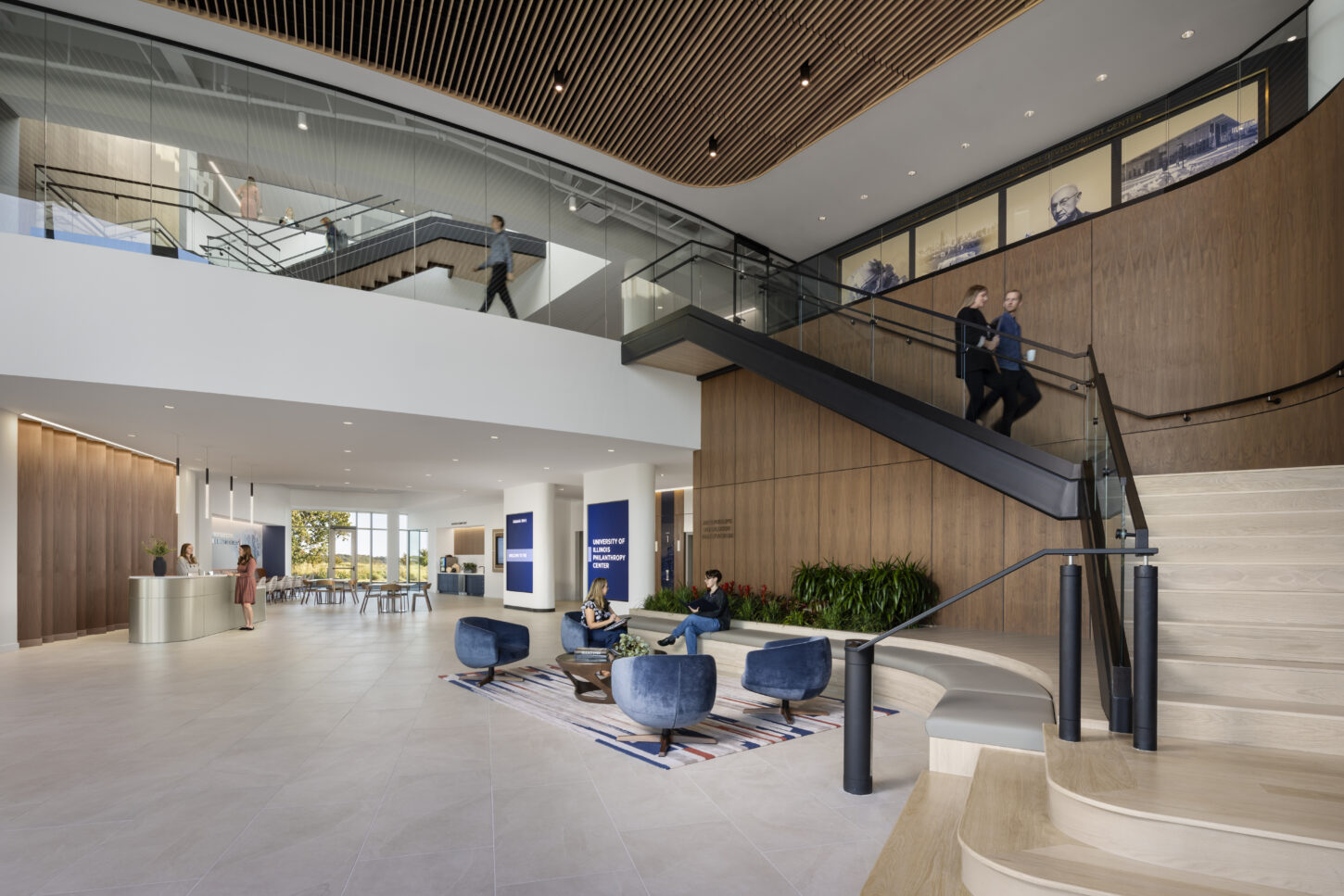 https://www.pmainc.com/wp-content/uploads/2023/08/Univ-of-Illinois-Foundation-HQ_Photo-Int-Lobby-2-w-People_Photograph-by-Andrew-Rugge-Copyright-Perkins-Eastman-1450x967.jpg